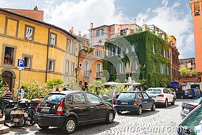 Cars parked outside the restaurant in Rome, Italy