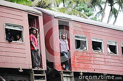 Cars of the passenger train with people
