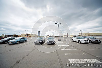 Cars on roof parking at shopping and entertainment center