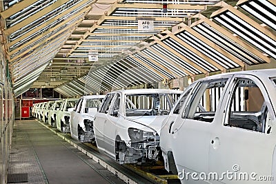 Cars in a row at car plant