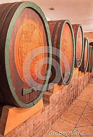 Carved casks in wine cellar of great Slovak producer.