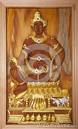 Carved wood image of lord krishna