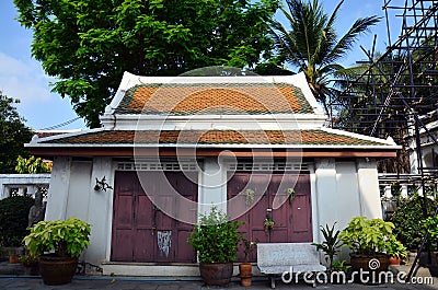 Carver restore and repair chedi at Wat Thepthidaramvaraviharn Temple in Bangkok Thailand