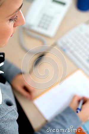 Casual business woman in office working