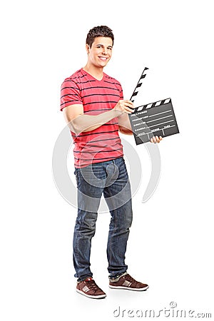 Casual man holding an open movie clap