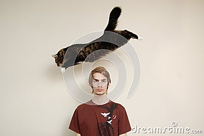 Cat Jumping Over A Man s Head