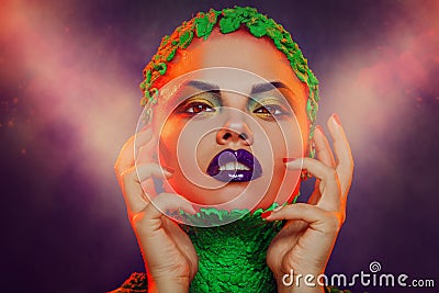 Caucasian woman with creative makeup in studio