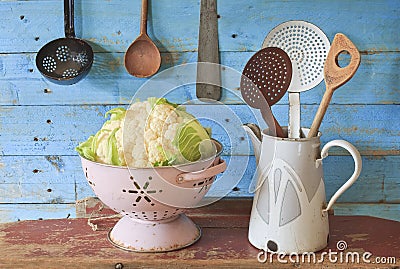 Cauliflower and kitchen utensils