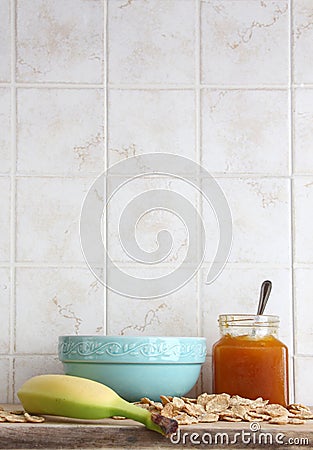 Ceramic cup with banana and jam, space for text