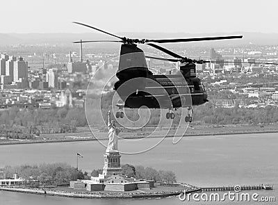 CH-46E flying in NYC with Statue of Liberty in the background