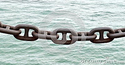 Chain links against water