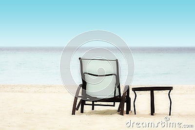 Chair and Table on the Beach