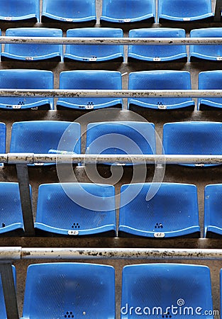 The chairs of the stands of a football stadium