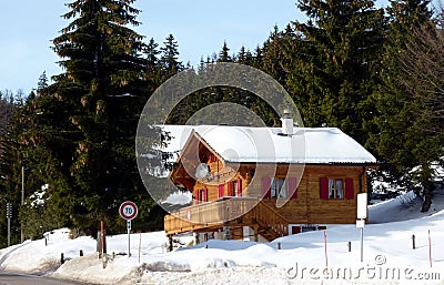 Chalet in Jura mountain Switzerland by winter