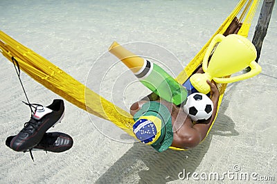 Champion Brazilian Football Player Celebrating with Champagne and Trophy