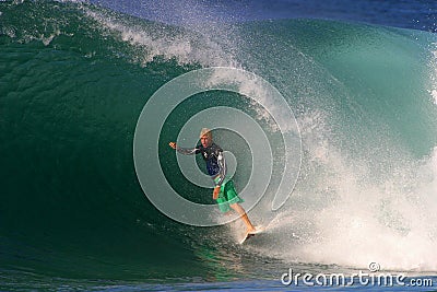 Champion Surfer Mick Fanning Surfing Hawaii