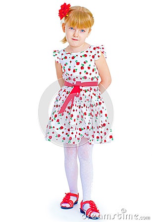 Charming little girl standing leg thrust forward