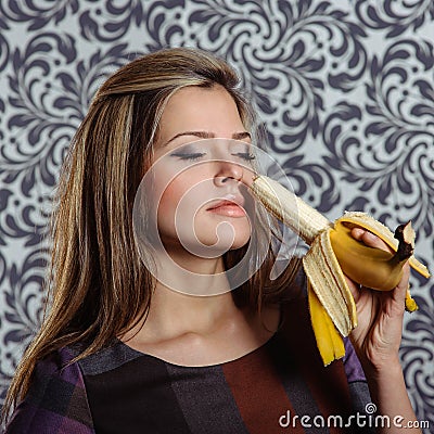 Charming woman with banana