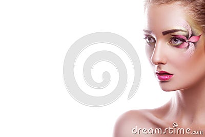 Charming young girl with creative make up on white background