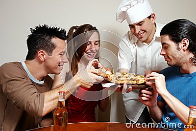 Cheerful group of youth in a pizza