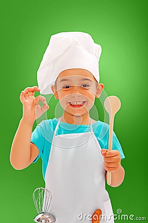 Cheerful little chef showing good taste