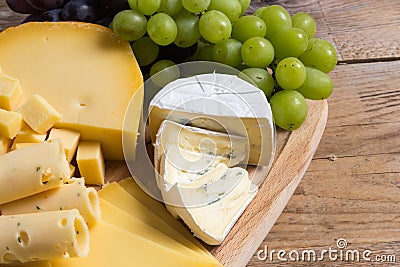 Cheese plate variation on a wooden table