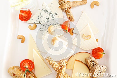 Cheese platter with cashew nuts