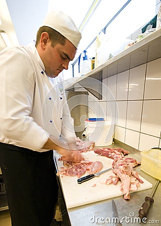 Chef chopping meat