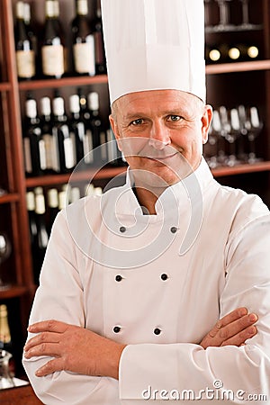 Chef cook confident professional posing restaurant