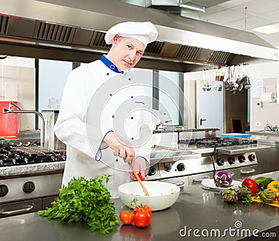 Chef cooking in his kitchen