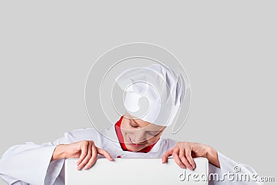 Chef hands holding white banner