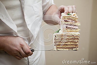 Chef holding cake cuttings