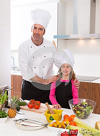 Chef master and junior pupil kid girl at cooking school