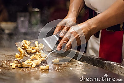 Chef preparing garlic shrimp