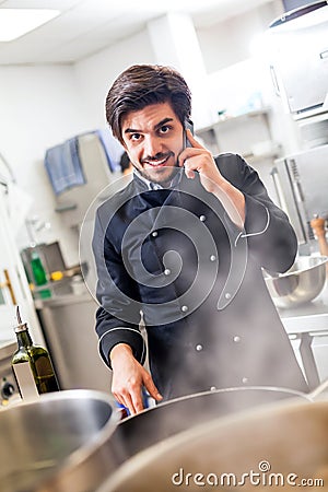 Chef taking a call on his smartphone