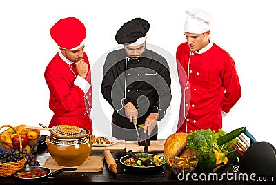 Chef teacher with students in kitchen