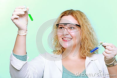 Chemist woman with chemical glassware tubes