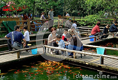 Chengdu, China: Families Feeding Fish