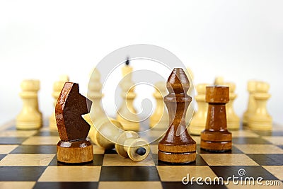Chess on the board on white background