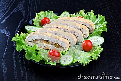 Chicken roll, lettuce, tomatoes and cucumbers