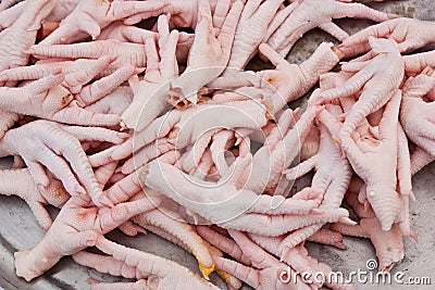 Chickens feet put it on the market for sale.