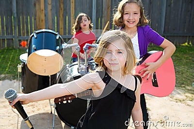 Chidren singer girl singing playing live band in backyard