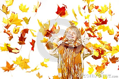 Child in autumn leaves. Maple fall over white