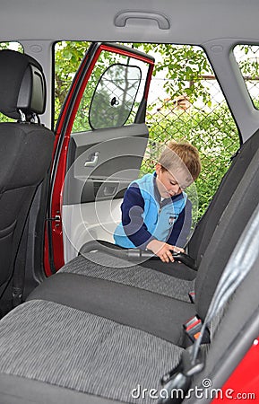 Child cleaning car interior