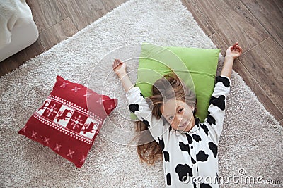 Child in cow print pajamas