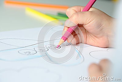 Child drawing a plane