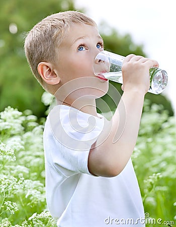 Child drinking pure water