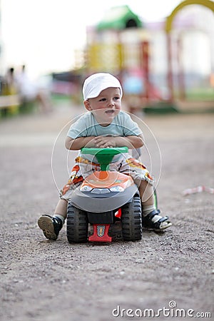 Child drives toy Quad Bike