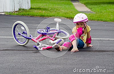 Child falling off a bike