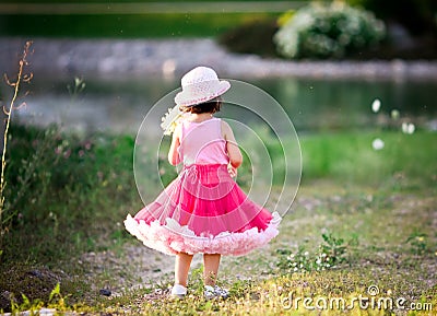 Child in a flower field
